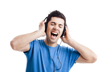 Image showing Young man listen music