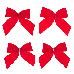 Image showing Four gift red ribbon and bow