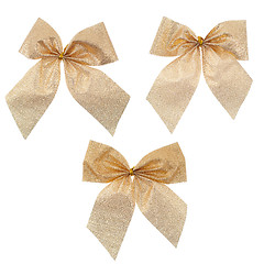Image showing Three gift gold ribbon and bow