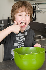 Image showing Boy Eating Dough