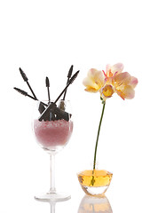 Image showing cosmetics and flower, beauty concept