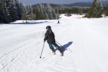 Image showing young boy skiing