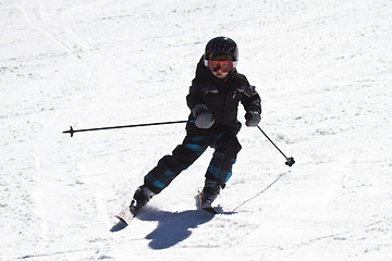 Image showing young boy skiing