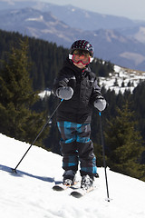 Image showing young boy skiing