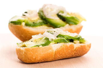 Image showing Sandwich with avocado on a wooden board 