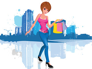 Image showing Young woman with shopping bag in city