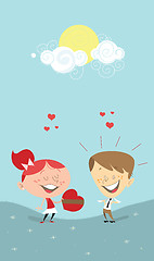 Image showing Valentine's heart gift, girl giving a gift to a boy