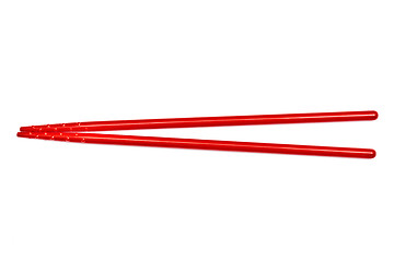 Image showing Red chopsticks isolated on white 