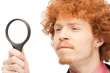 Image showing man with magnifying glass