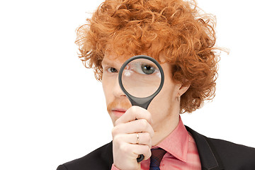 Image showing man with magnifying glass