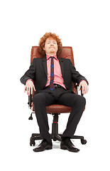 Image showing young businessman sitting in chair