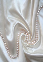 Image showing Smooth elegant white silk with pearls as wedding background 