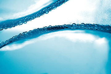 Image showing Air bubbles in blue water