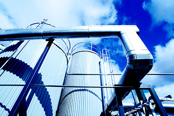 Image showing Modern industrial factory against blue sky