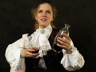 Image showing Woman with cup of red wine