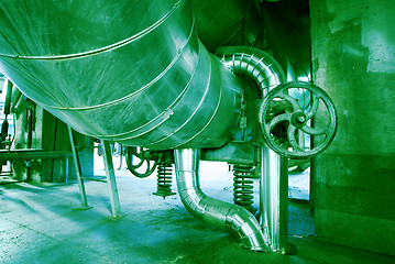 Image showing Equipment, cables and piping as found inside of a modern industr