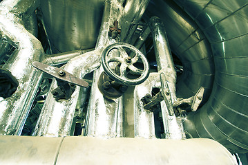 Image showing Equipment, cables and piping as found inside of a modern industr