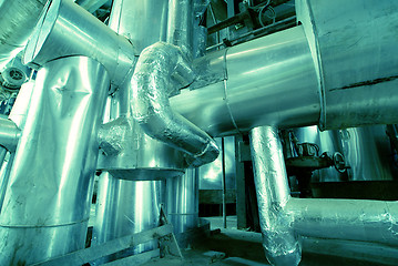 Image showing Equipment, cables and piping as found inside of a modern industr