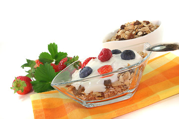 Image showing muesli with yogurt, fresh fruit and nuts