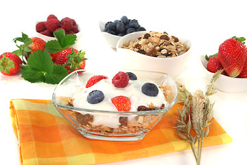 Image showing muesli with yogurt, fresh fruit and nuts