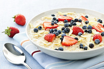 Image showing Bowl of oatmeal with berries