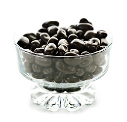 Image showing Bowl of chocolate coated cranberries or raisins