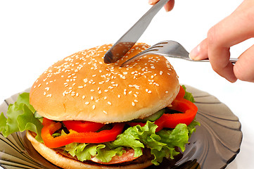 Image showing Big hamburger on a plate meal time