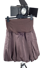 Image showing Skirt hanging on studio lighting