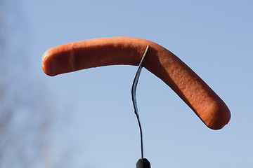 Image showing Sausage on fork