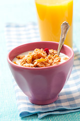 Image showing Breakfast with cereal with orange juice