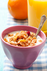 Image showing Breakfast with cereal, orange and orange juice