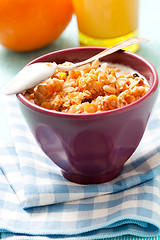 Image showing Breakfast with cereal, orange and orange juice