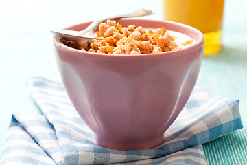 Image showing Breakfast with cereal with orange juice