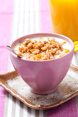 Image showing Breakfast with cereal with orange juice