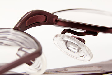 Image showing A  pair of  folded eye glasses