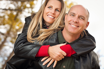 Image showing Attractive Couple in Park with Leather Jackets