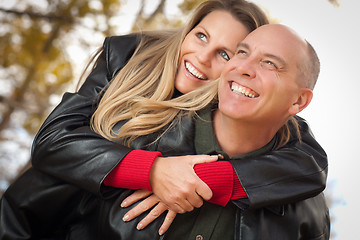 Image showing Attractive Couple in Park with Leather Jackets