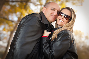 Image showing Attractive Couple in Park with Leather Jackets