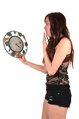 Image showing Girl with clock.