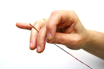 Image showing Needle and thread for sewing