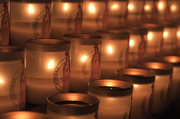 Image showing Candles burning in church