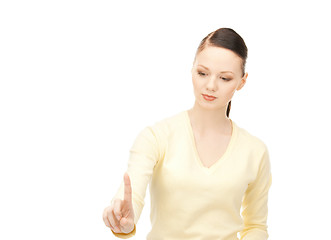 Image showing businesswoman working with something imaginary