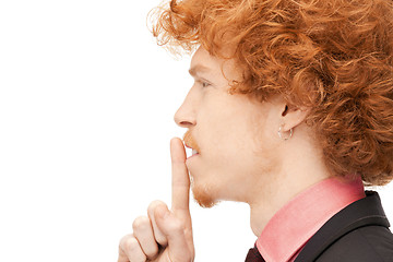 Image showing finger on lips