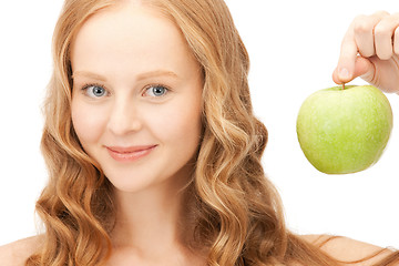 Image showing young beautiful woman with green apple