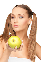 Image showing young beautiful woman with green apple