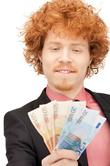 Image showing handsome man with euro cash money
