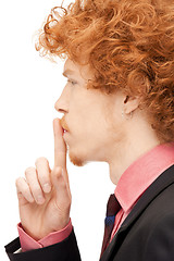 Image showing finger on lips