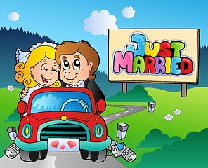 Image showing Just married couple driving car