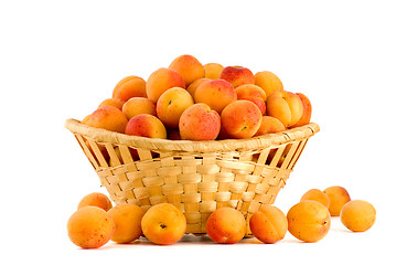 Image showing Apricots in a wicker basket