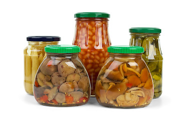 Image showing Glass jars with marinated vegetables and mushrooms
